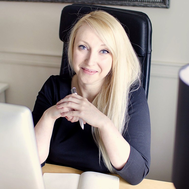 Evelina Mierzwinska at her desk